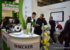 Okan Tüysüz of  Becker talking with a visitor.